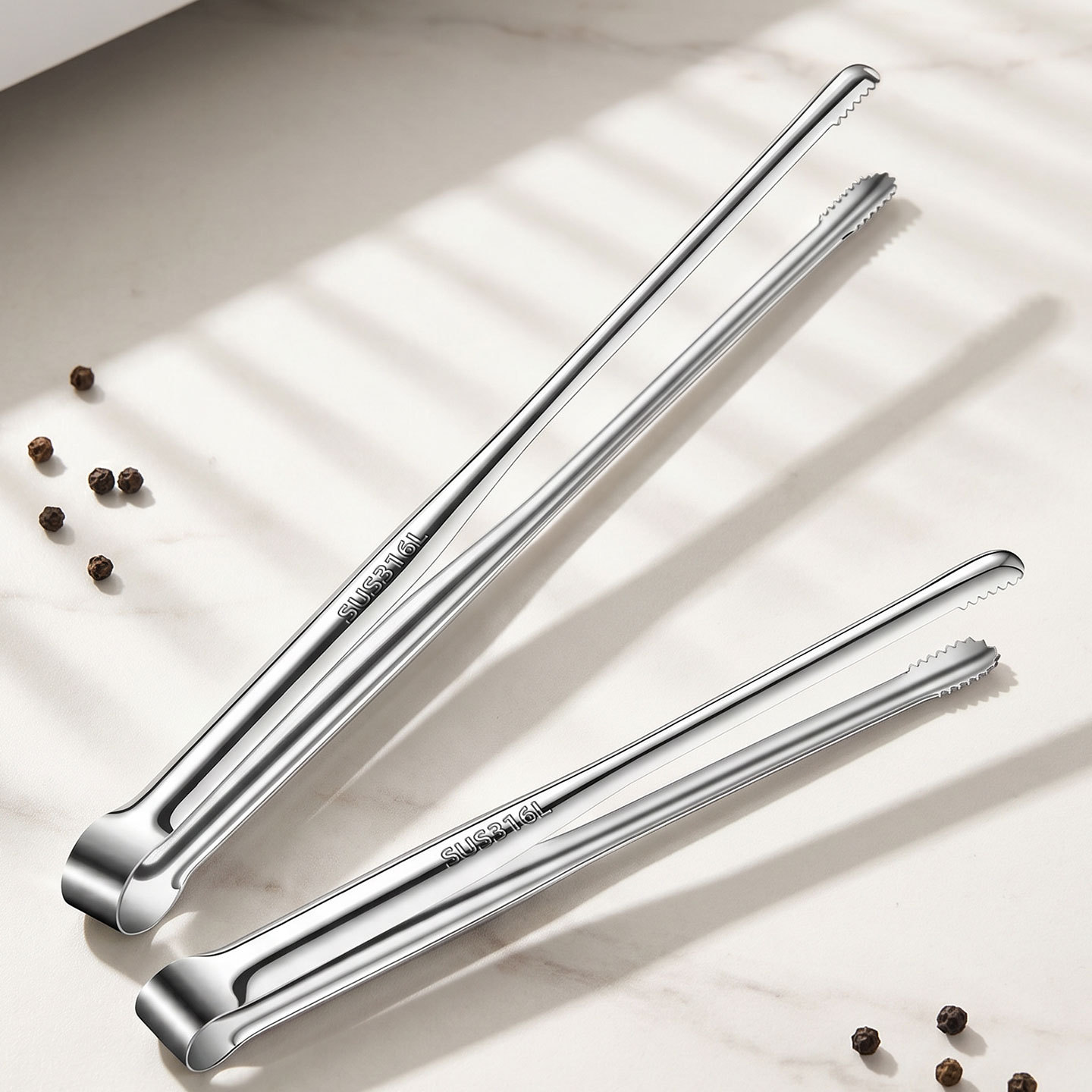 Pinces de cuisine en acier ino - Camping Cooking Device avis et prix